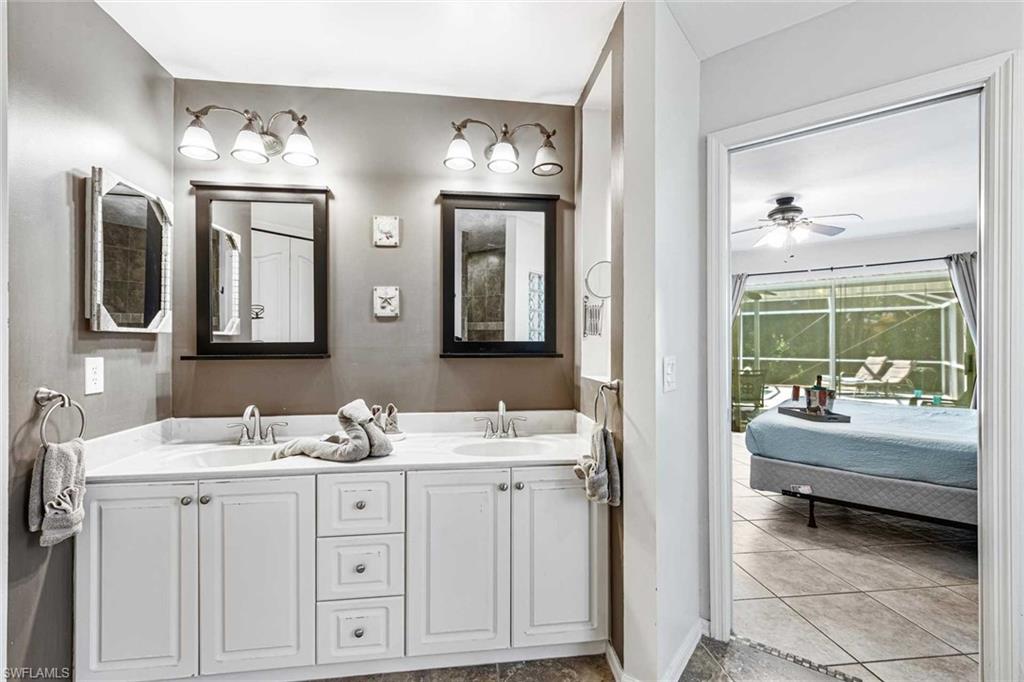 The primary bathroom has a double-sink vanity