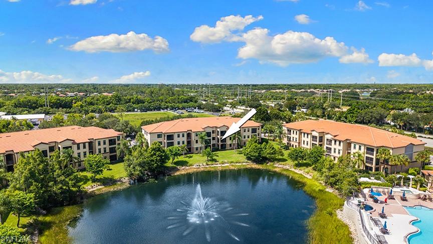 Aerial of the back of the building.  Arrow to unit.