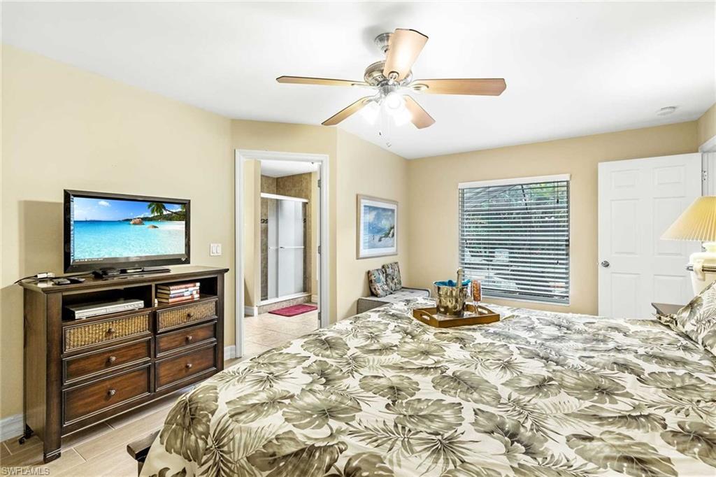 The primary bedroom has a King bed and flat-screen TV