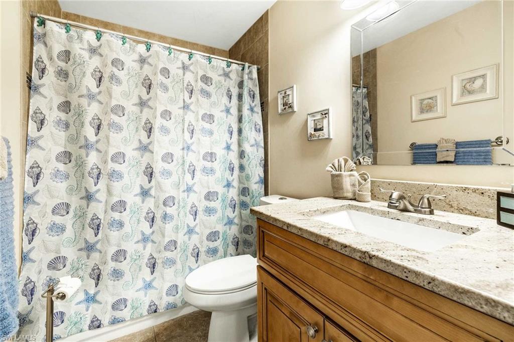 Guest bathroom offers a shower/tub combo