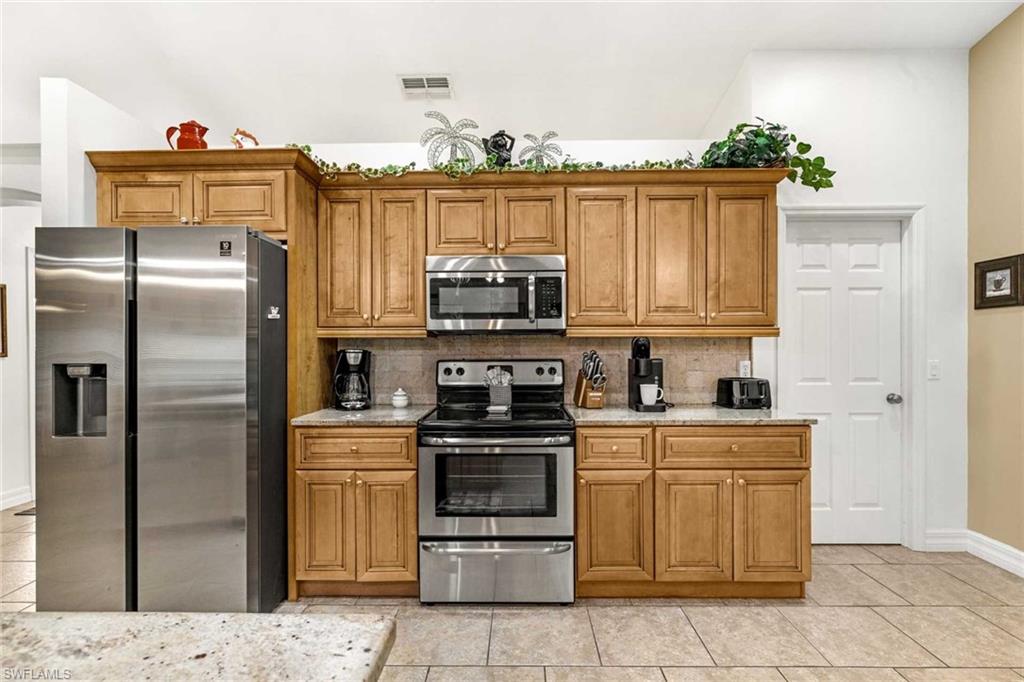Fully equipped kitchen with stainless steel appliances
