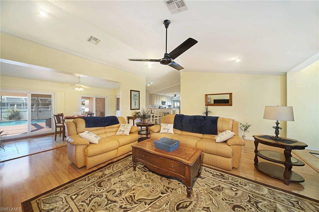 Enjoy the living area with vaulted ceilings and a flat-screen TV