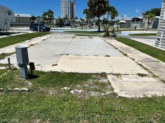 rear of the lot with view of electric box which needs updating
