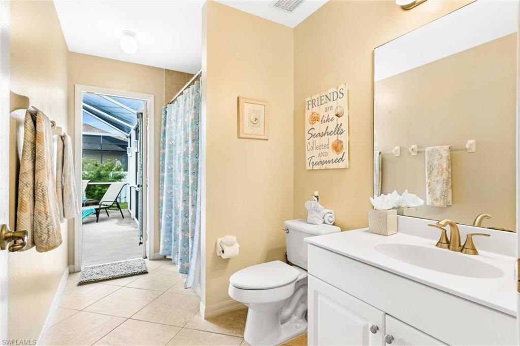 Guest bathroom offers a shower/tub combo & doubles as the pool bathroom