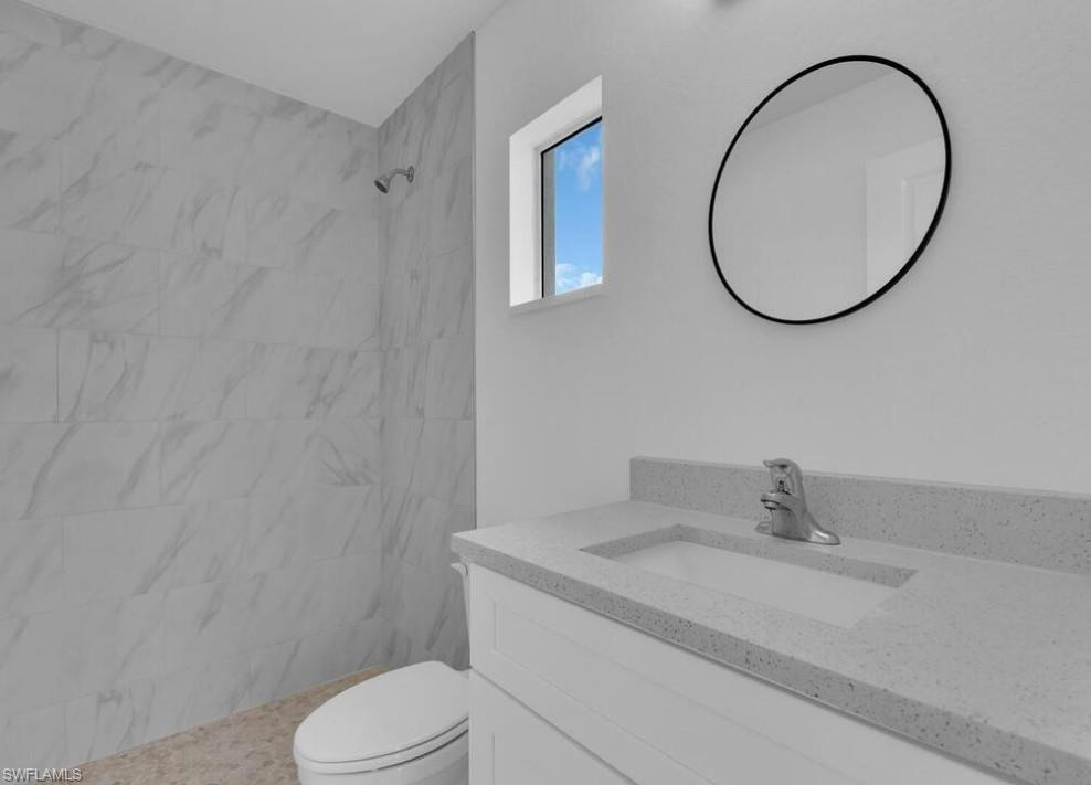 optional second owner's suite - private bath/segundo dormitorio principal - bano privado