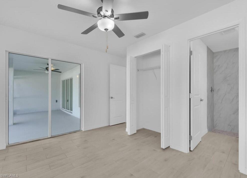 optional second owner's suite with private bath and lanai access/segundo dormitorio principal con bano privado y acceso a la terraza