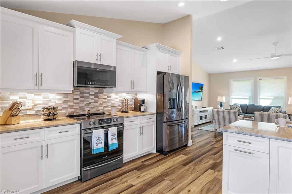 The fully-equipped kitchen with stainless steel appliances