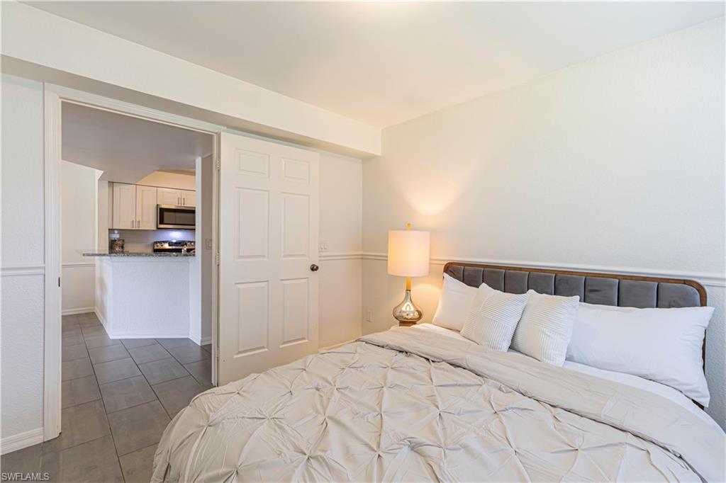 walk in laundry with extra storage space