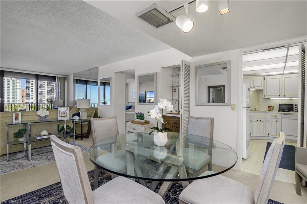 Dining room with a textured ceiling