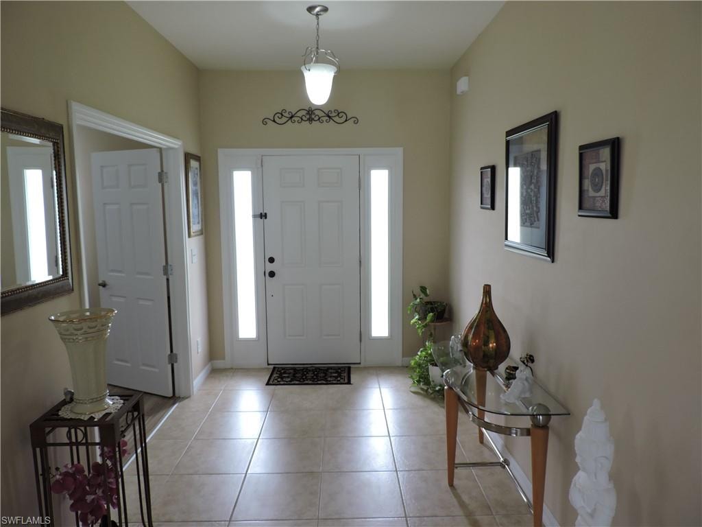 FRONT FOYER AND DEN