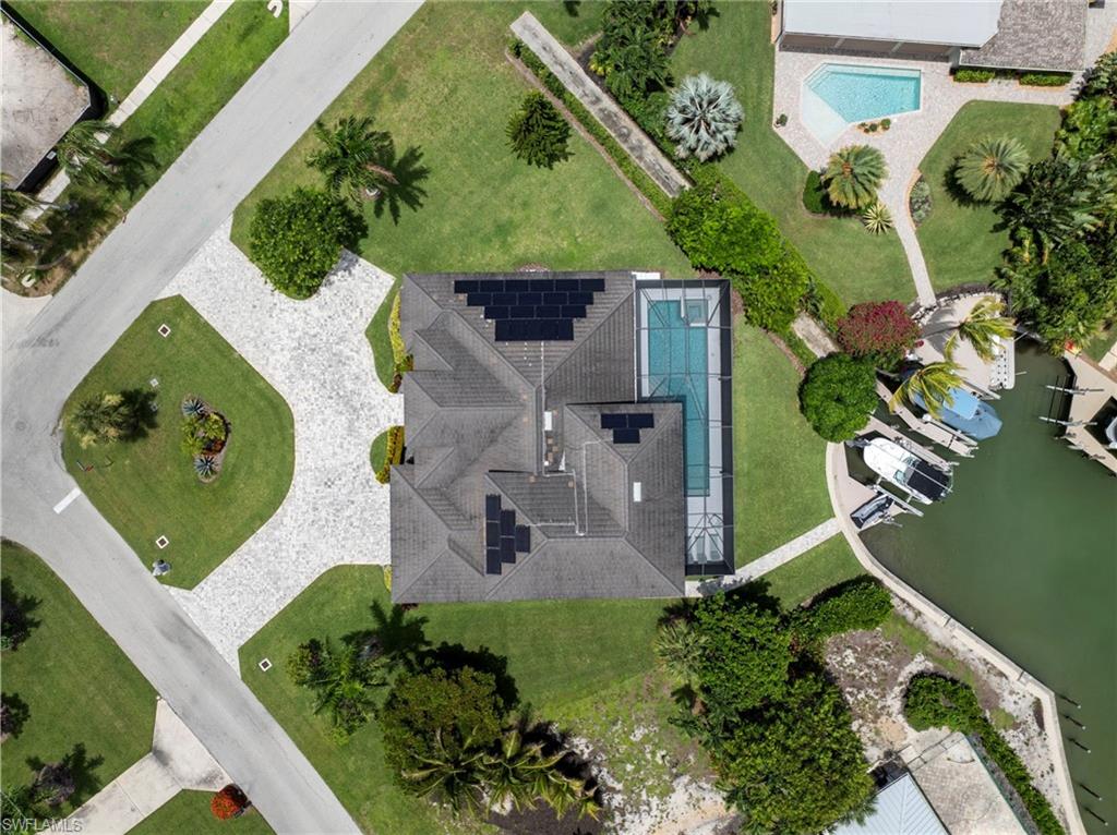 Aerial perspective showcasing the property's waterfront location