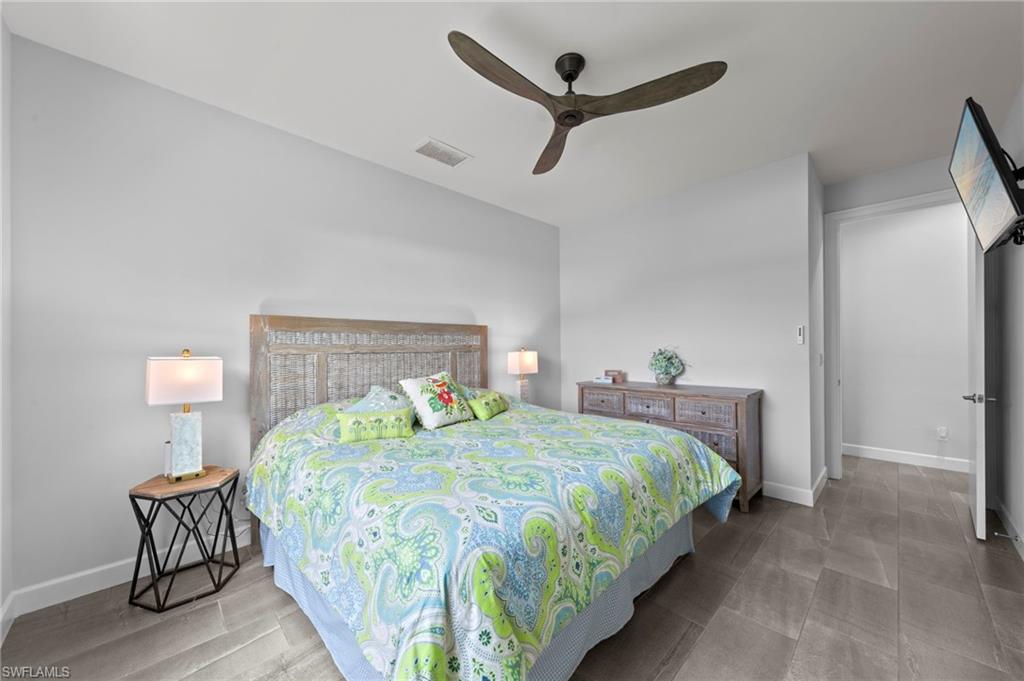 Recessed lighting and ceiling fan overhead