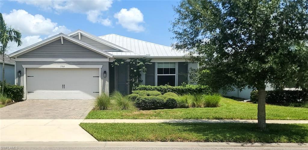 Charming home with 2 car garage.