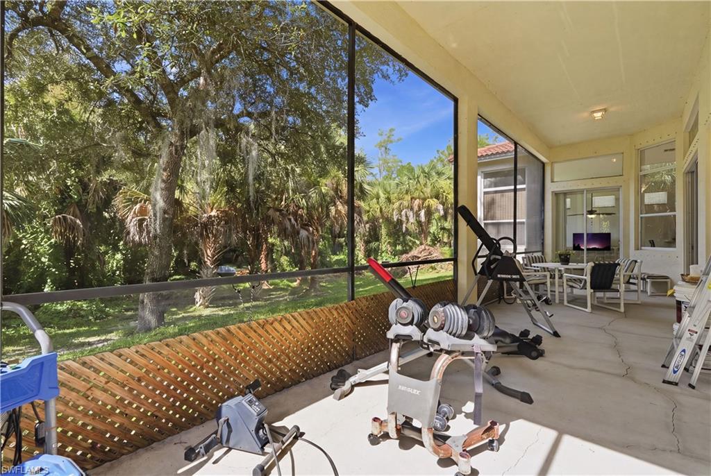 Expansive screened lanai with concrete flooring