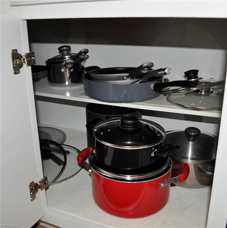 White interior cabinetry with adjustable shelving