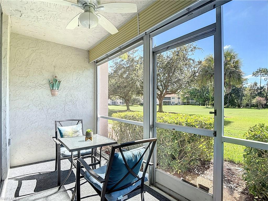 Sunroom featuring ceiling fan