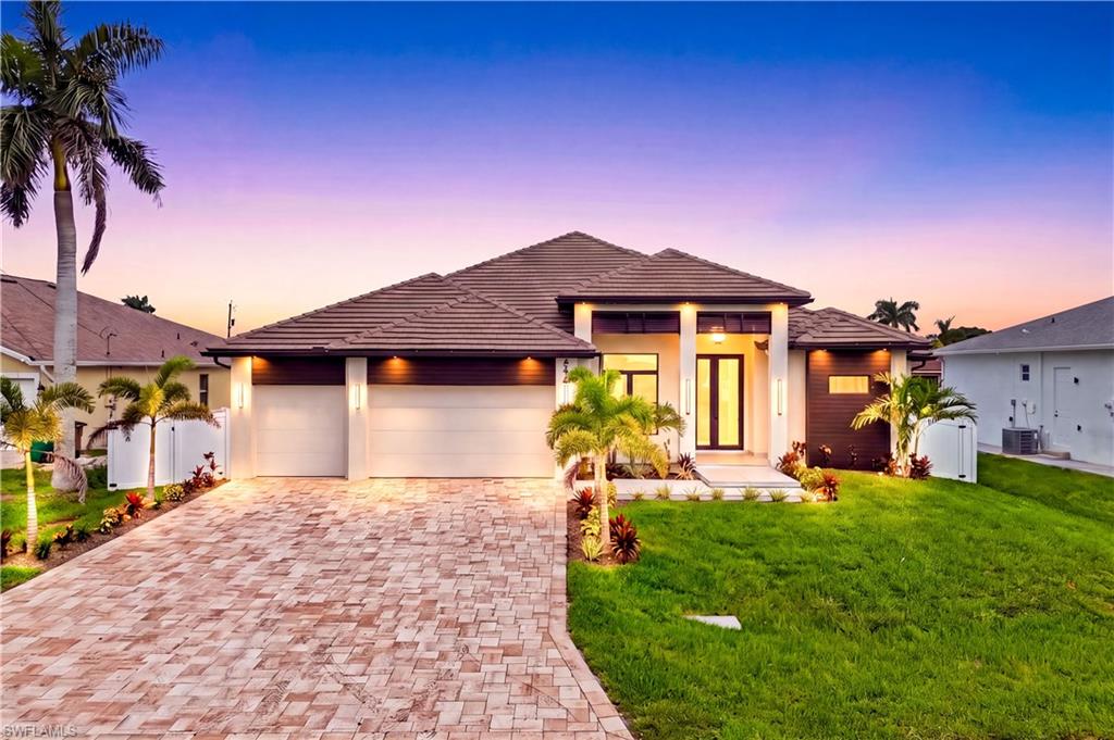 Exceptional 2,420 sq ft contemporary home w/ sophisticated architecture, premium craftsmanship & luxurious finishes create the perfect SWFL retreat!