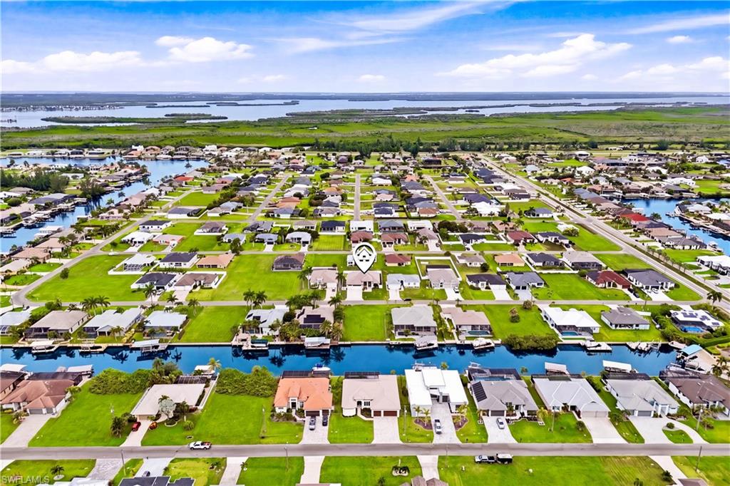 Prime Cape Coral location with convenient access to dining, shopping, entertainment and waterfront recreation.
