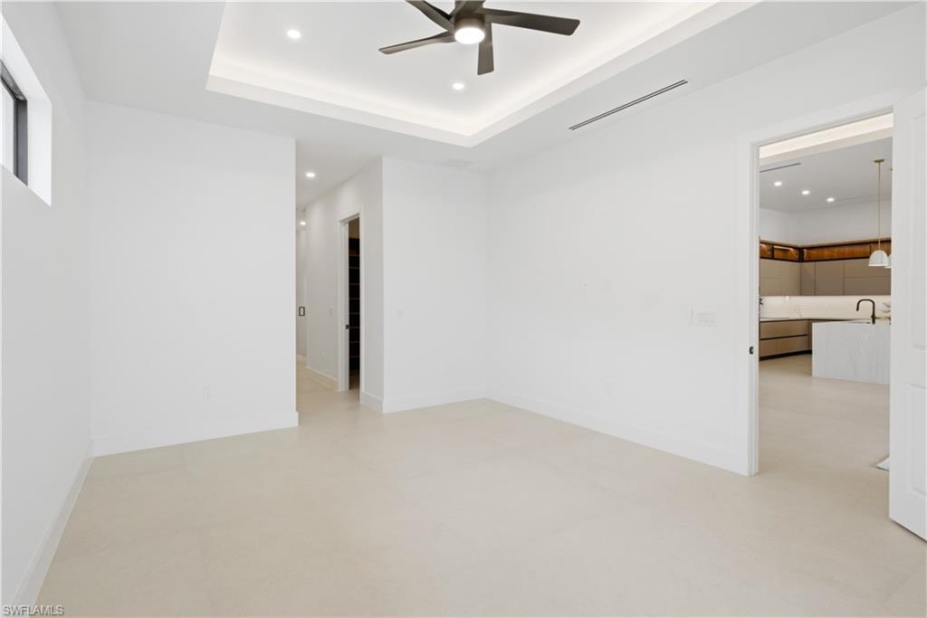 Spacious primary suite offers a serene retreat with clean contemporary finishes and abundant natural light.