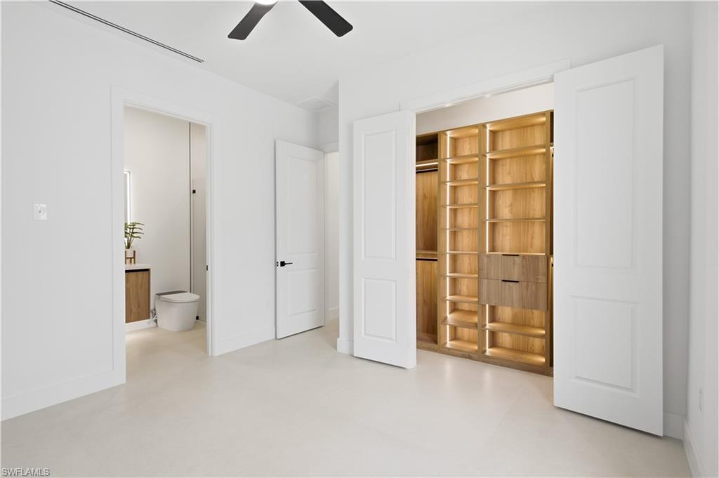 Split-bedroom layout provides outstanding privacy w/ spacious guest suite featuring its own ensuite bath, plus additional guest bedroom, full bath & versatile flex den ideal for home office, media room, or fitness space.