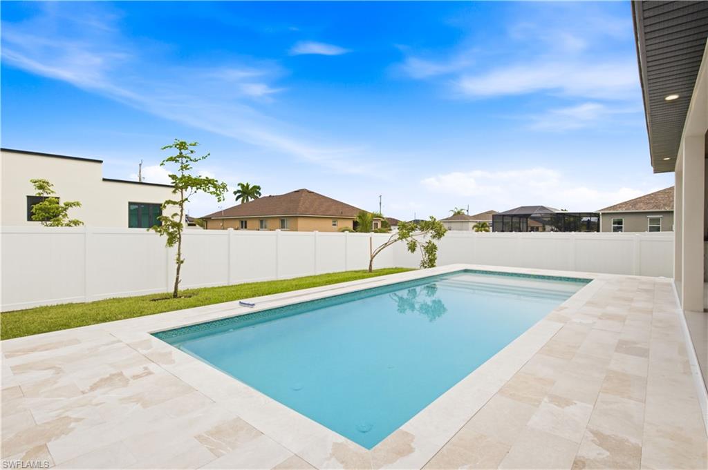 Fully fenced backyard offering privacy & plenty of room to relax or entertain