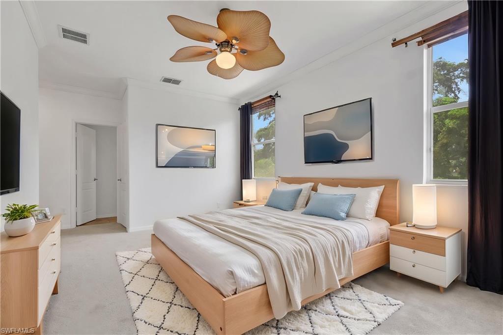 Virtually staged primary bedroom suite
