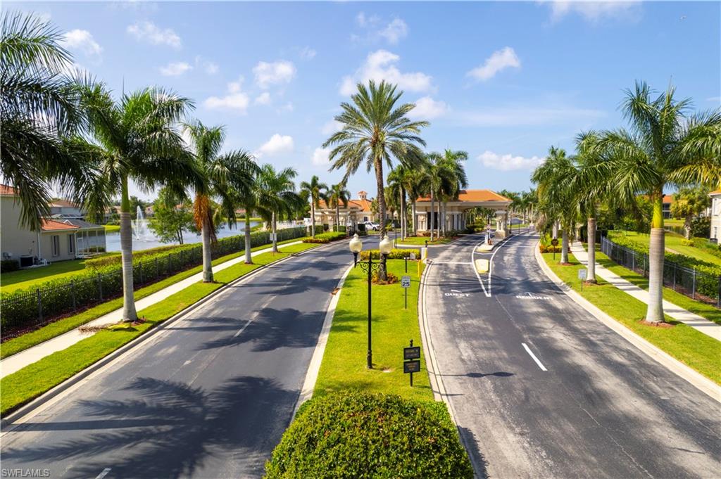 Entry to community with royal palms