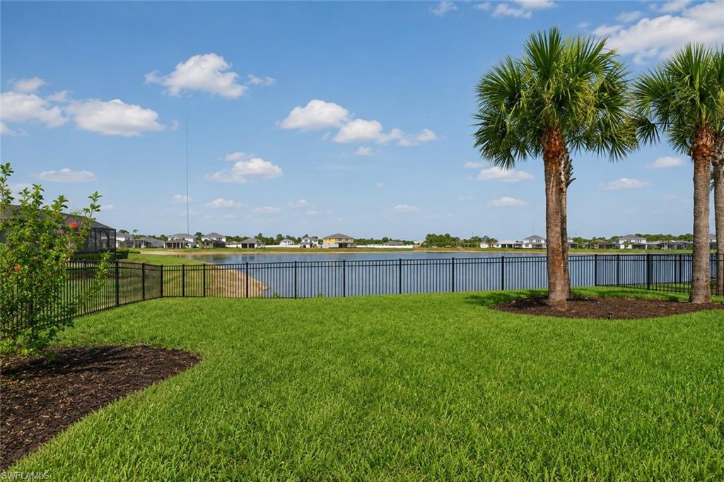 Fenced Yard with lake view