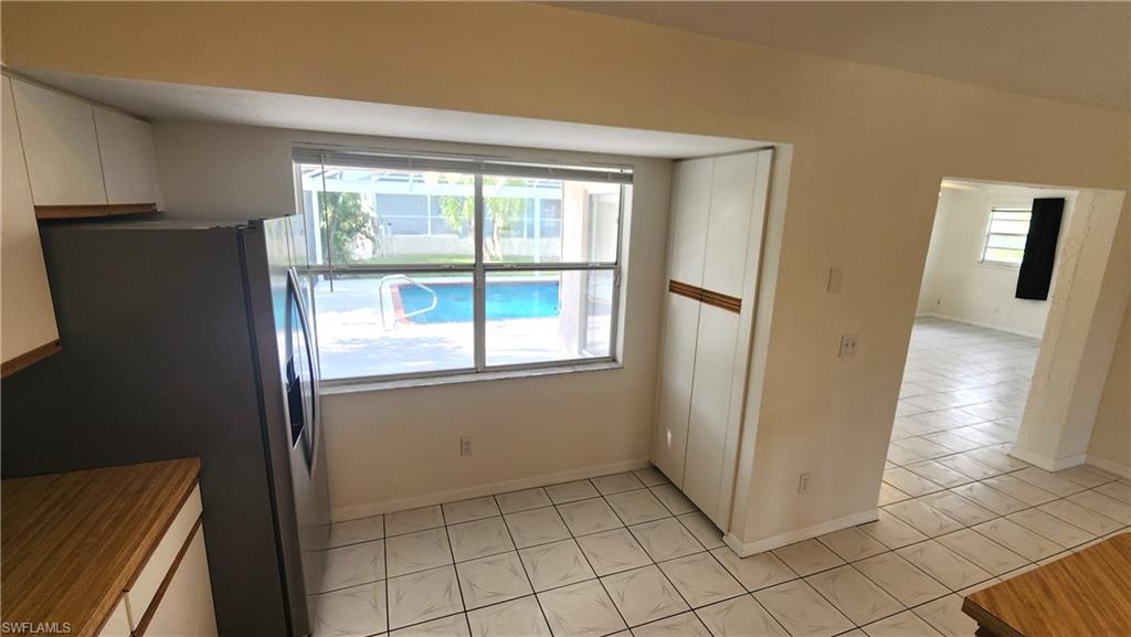 Watch kids in Pool while you cook, pass through buffet window