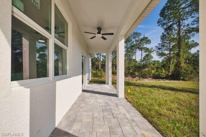 View of patio with ceiling fan