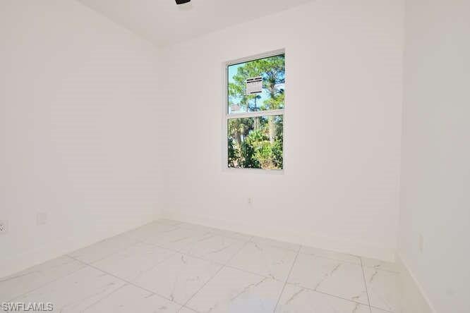 Empty room with marble finish floors