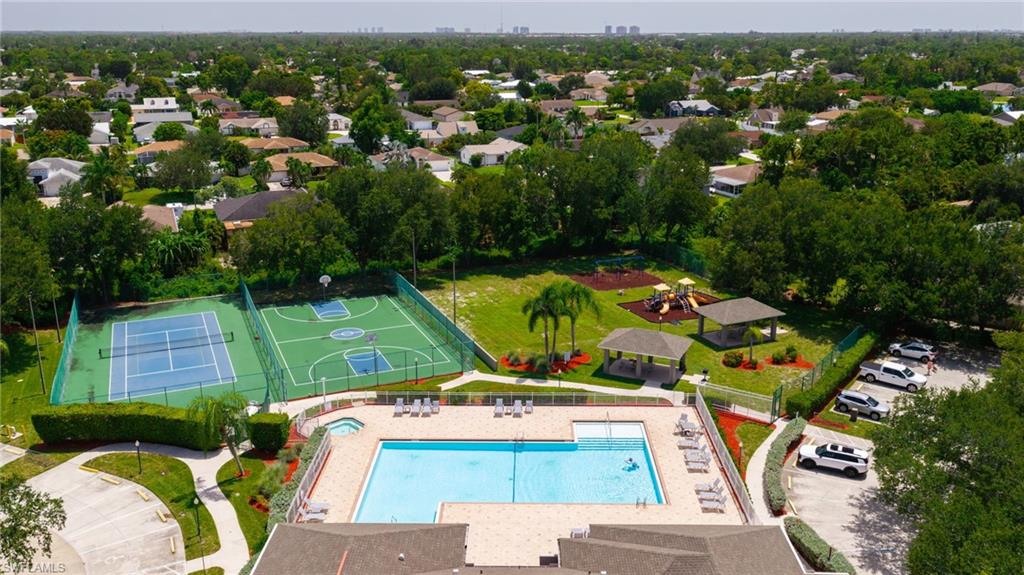 Jr Olympic Size Pool - Great for Laps our Lounging, Courts, Playground & BBQ Pavilions