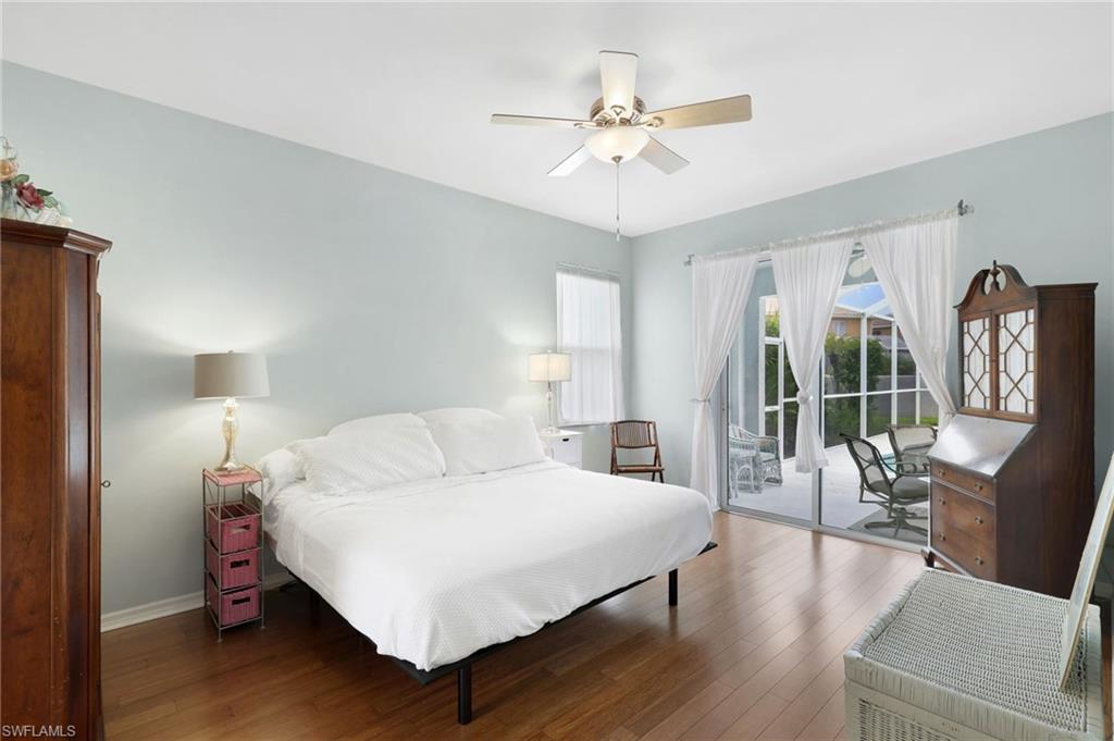 Primary Bedroom with Sliders to Pool and Lanai