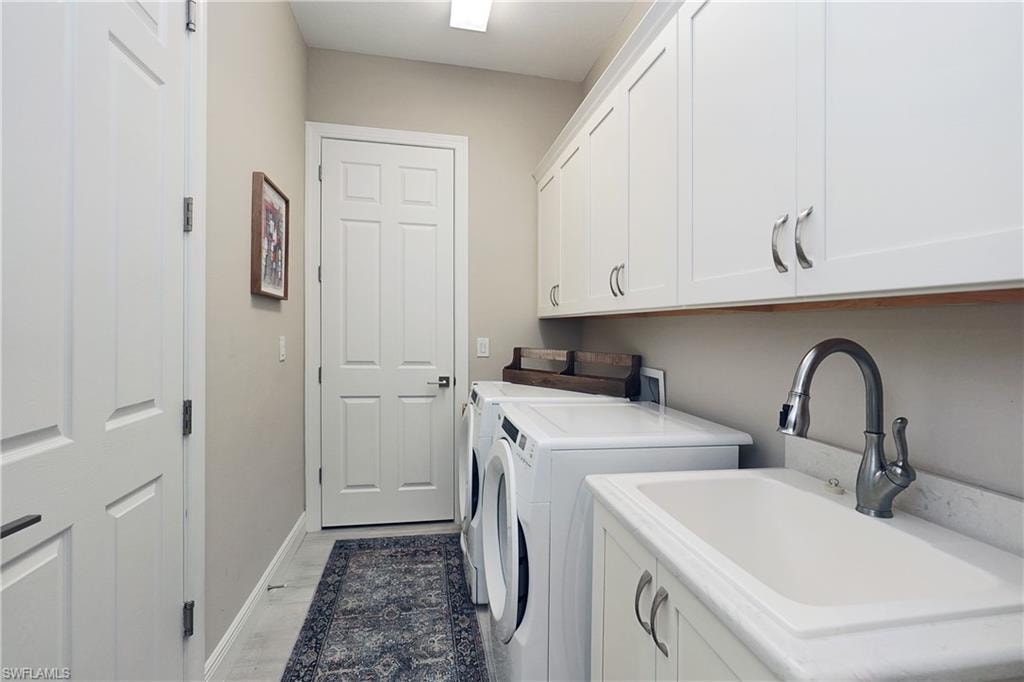 just off kitchen front entry and to garage W/D new 2022