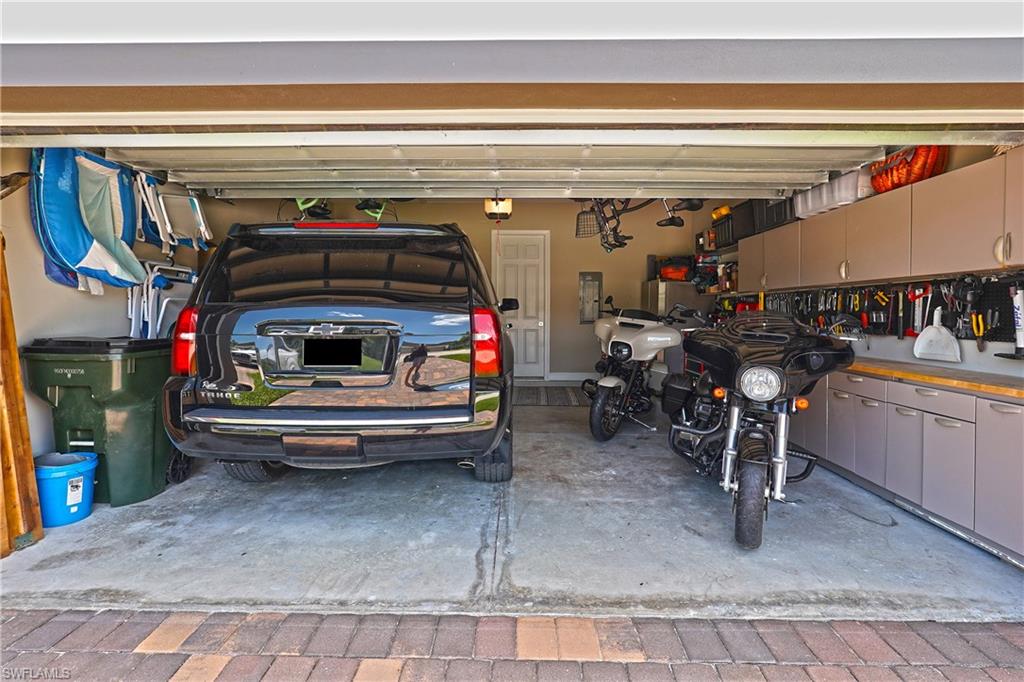 2 car garage fits large SUV +storage and work area