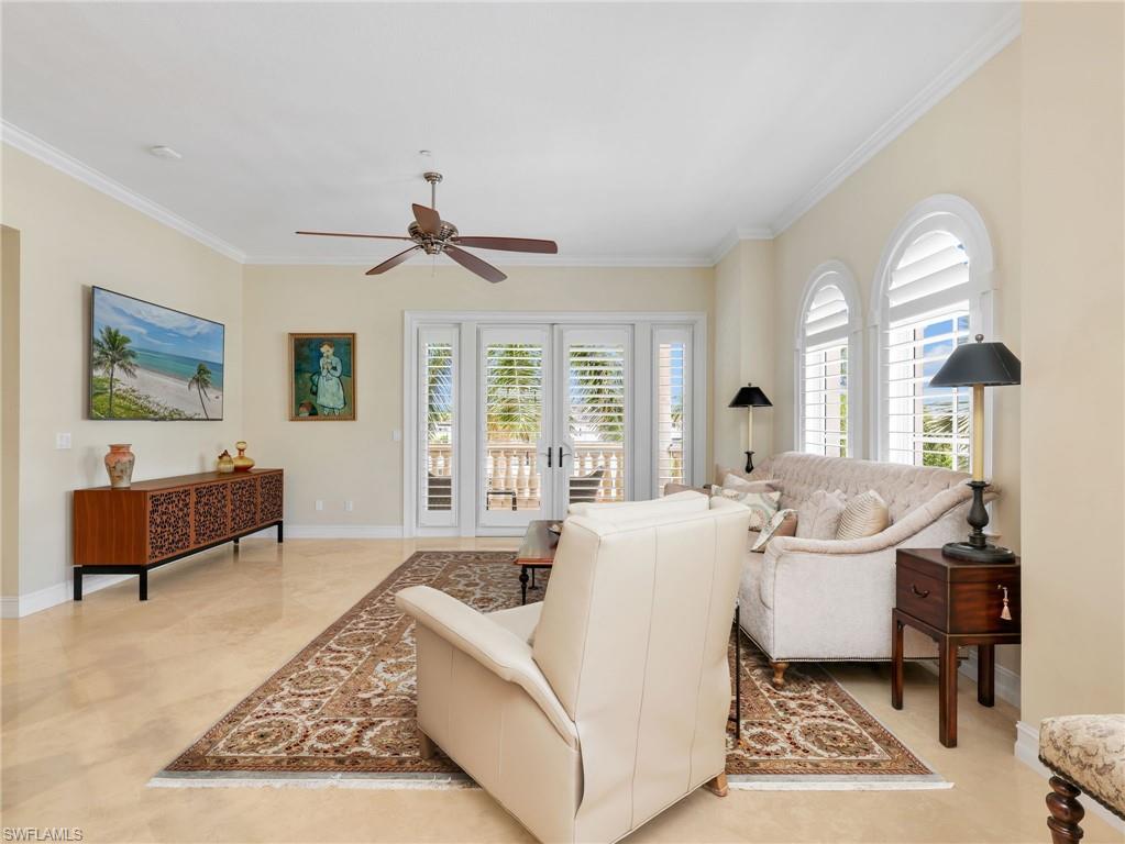 French Doors off the great room to the covered Balcony