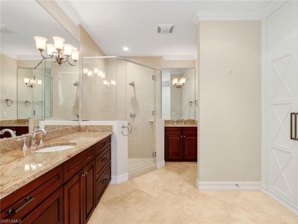 Dual separate sinks with walk in tile shower