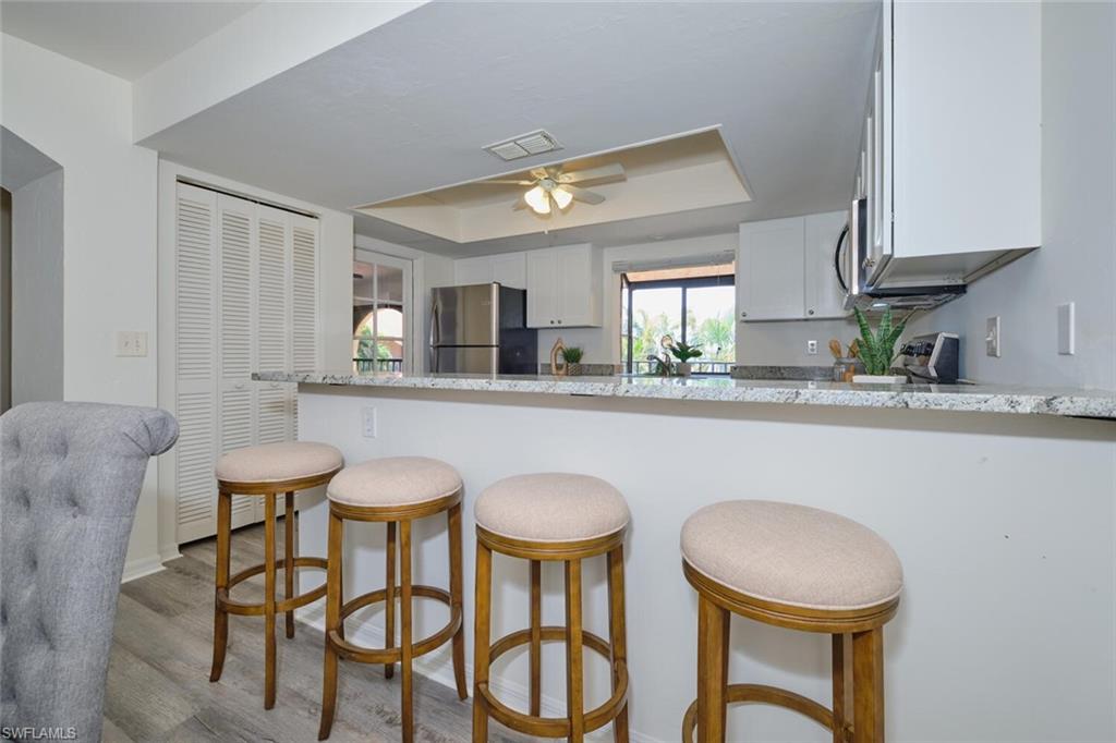 Kitchen featuring a breakfast bar