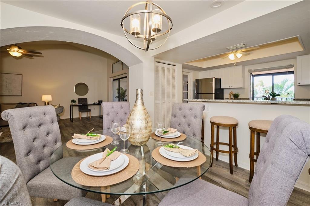 Dining area with orb chandelier