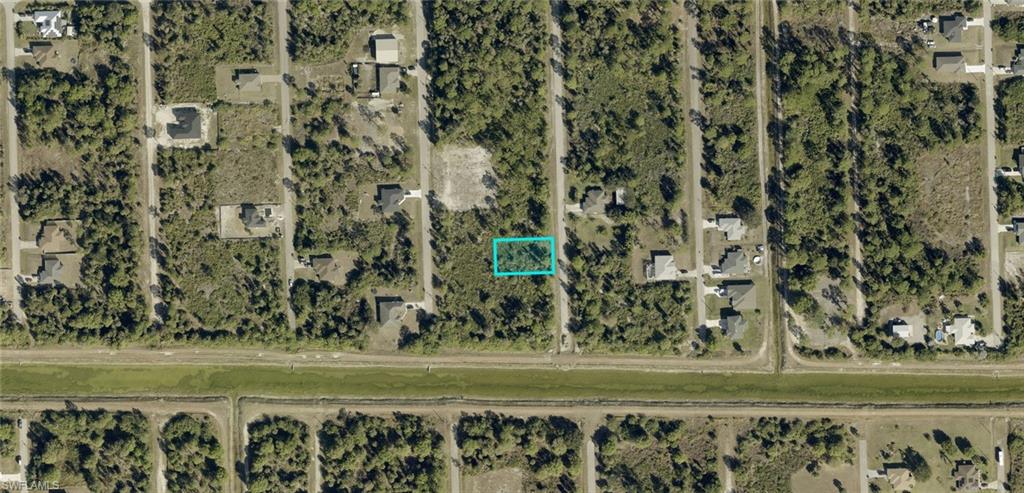 Aerial Property Overview. Illustrating the land parcel and surrounding environmental context