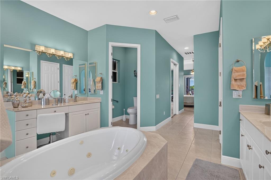 Master bath with private toilet room