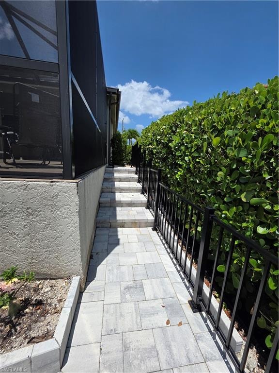 New paver steps on North side to access pool equipment