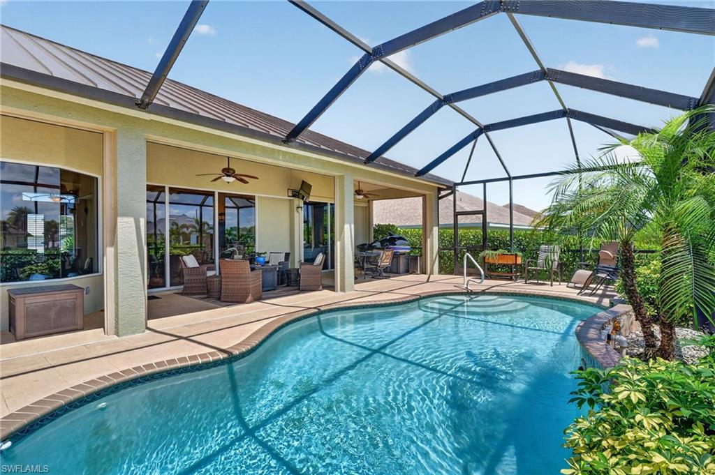 Private pool with waterfall and large lanai area