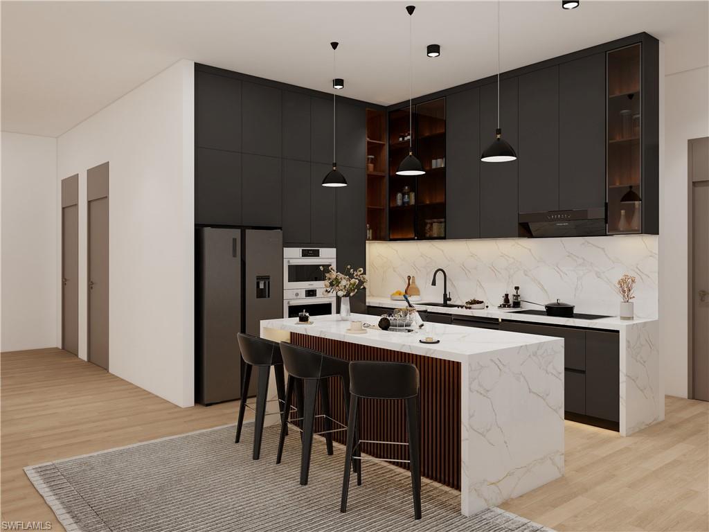 Modern kitchen featuring dark cabinetry, marble-finish countertops, stainless steel appliances, and a central island with integrated seating (Rendered photo)