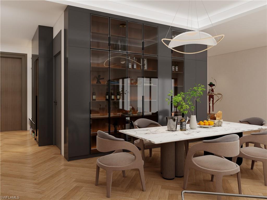 Dining area featuring a marble-finish table, herringbone wood-finish flooring, and a contemporary chandelier (Rendered photo)