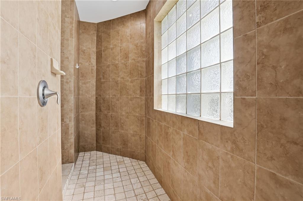 Spacious walk through shower - no shower glass to clean!