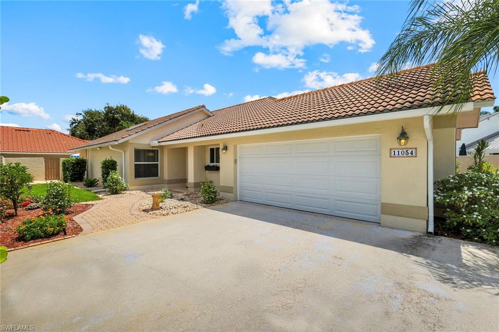 Welcome to this adorable ranch home with private back lanai, extended driveway situated on a private cut-de-sac.