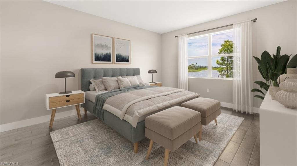 Expansive window, wood-finish flooring, and light wall finishes