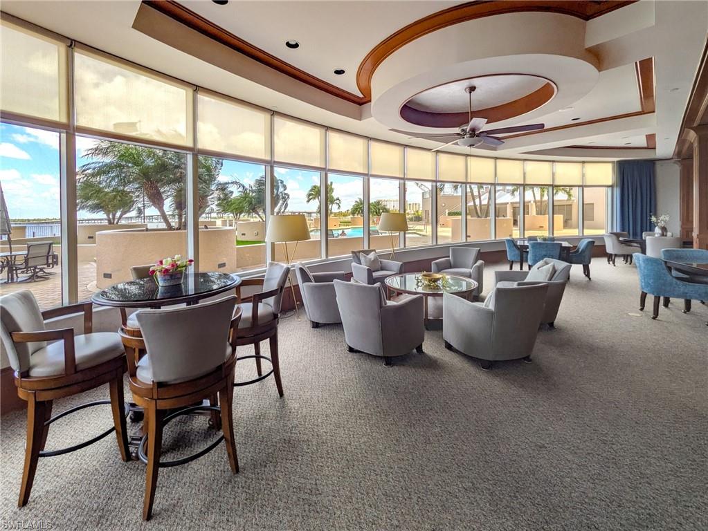 Lobby featuring a raised ceiling