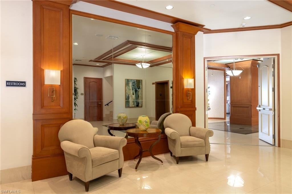Common area featuring recessed lighting and crown molding